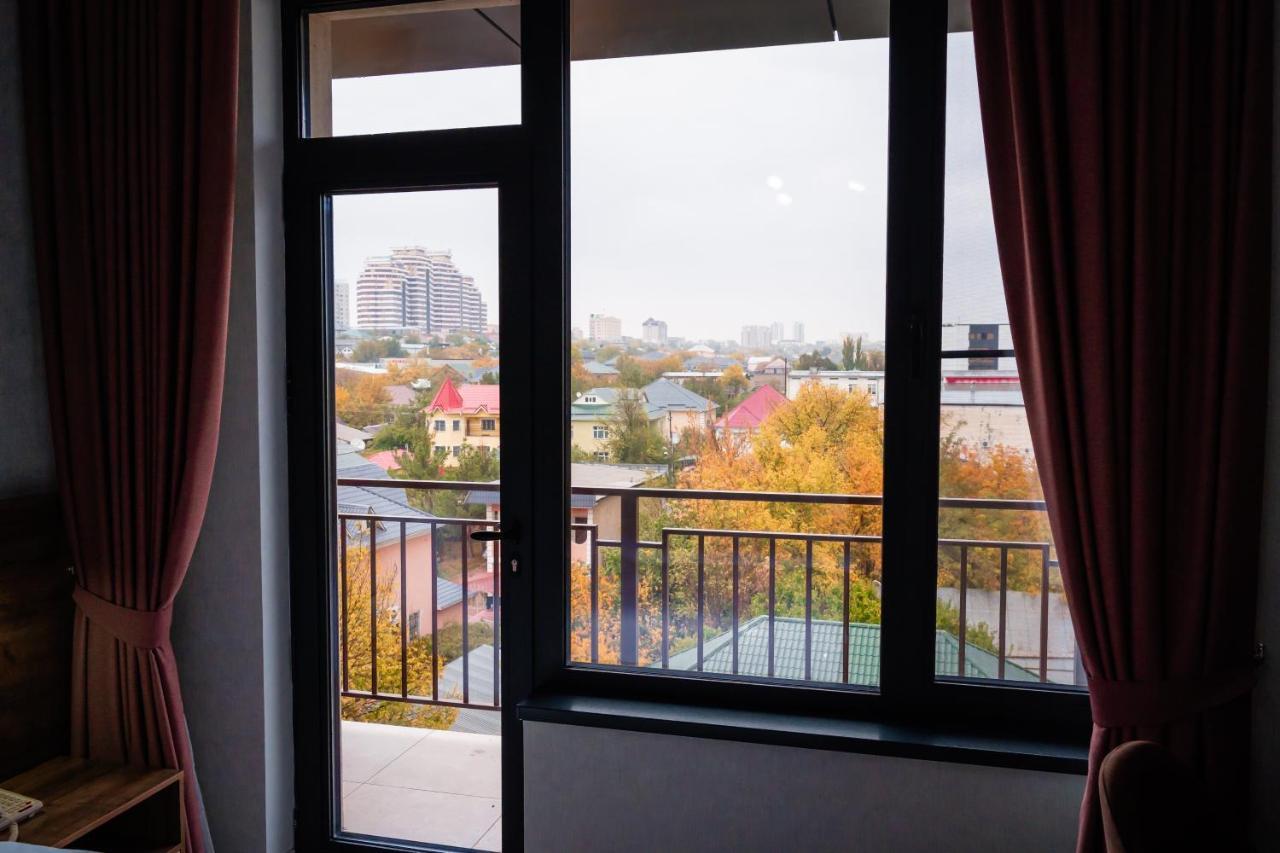 Cosmopolitan Hotel Shymkent Exterior foto